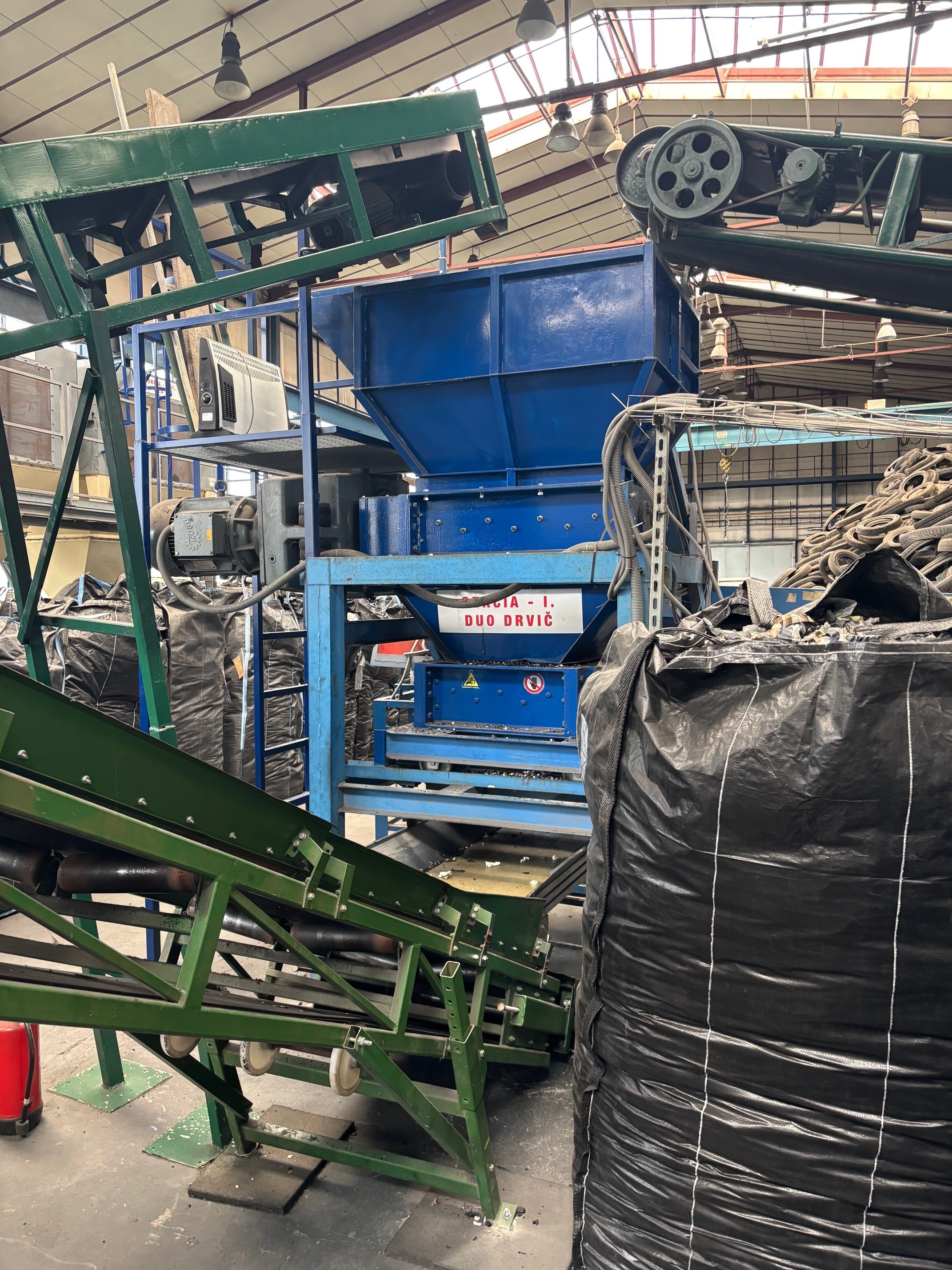 Shredders for industrial waste and material processing.